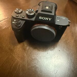 Sony A7Rii. Black Mirrorless Camera Body with Lens Cap